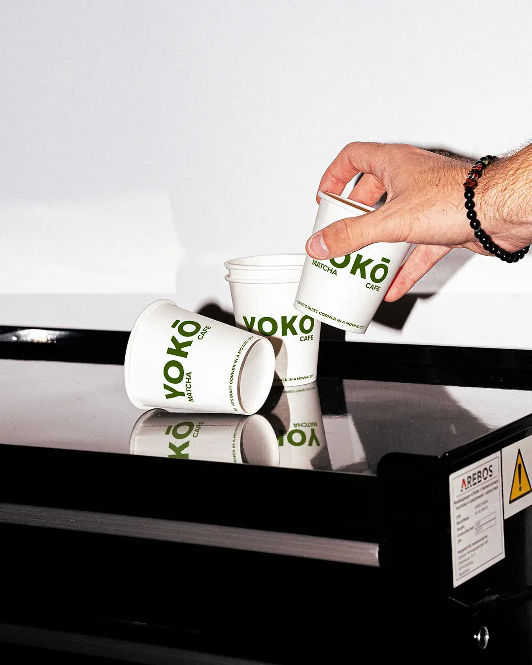 YOKŌ Cans On Top Of Coffee Machine